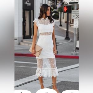 White vicidolls dress. Worn once. Gorgeous dress, fits true to size.